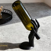 A Hand-Shaped Wine (Bottle Holder)